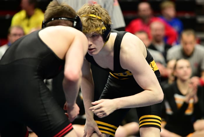 Bettendorf's Jake Knight looks at his opponent, Fort Dodge's Dru Ayala, during a Class 3A semifinal match at 120 pounds during the Iowa high school wrestling state tournament at Wells Fargo Arena in Des Moines on Friday. (Photo by Ryan Timmerman)